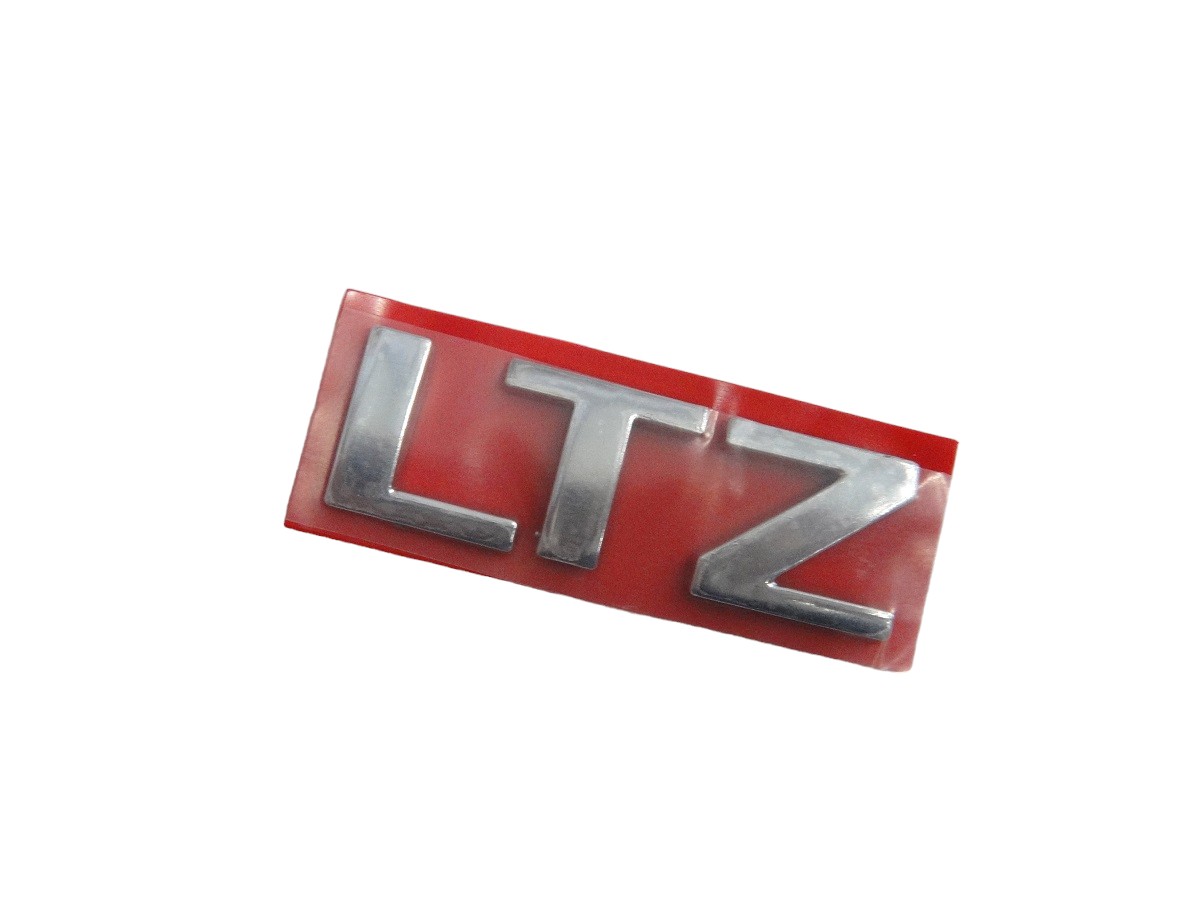 EMBLEMA TAPA TRASERA”LTZ” CHEVROLET ONIX/PRISMA/PUERTA AGILE